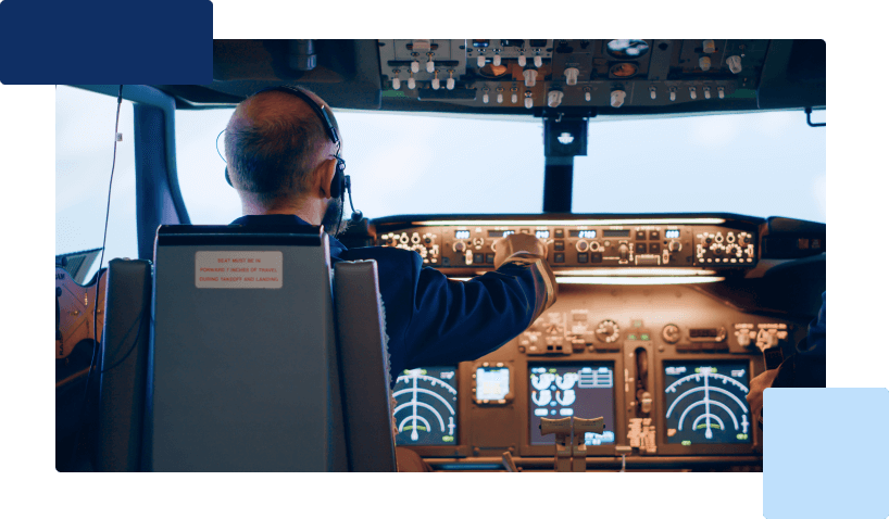 a pilot in an airplane cockpit